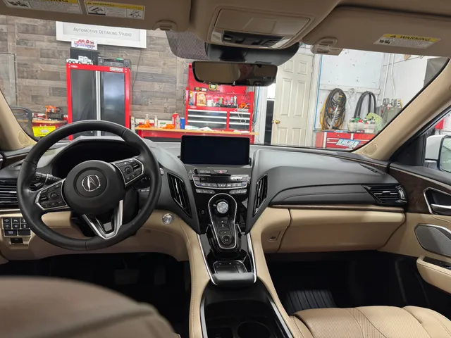 Acura RDX dashboard and center console after detailing