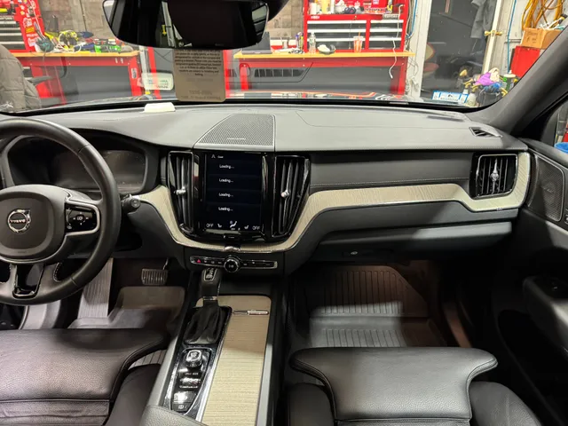 Volvo XC60 dashboard detail with wood trim accents